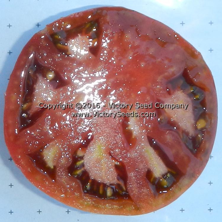 'Cherokee Purple' tomato slice.